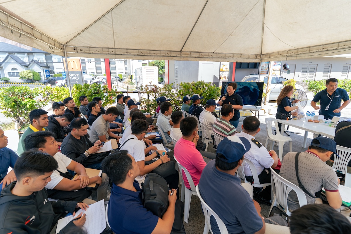 Careers on Wheels recruitment briefing — seafarers attending a Crossworld Marine outdoor session in Mindanao, April 2026
